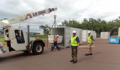 ARM instrumentation being uninstalled and packed in a sea container from the Darwin, Australia, site for the return to the United States.