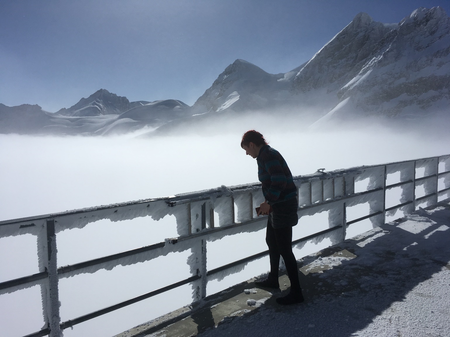 Jessie Creamean looks down from a mountaintop research facility in Switzerland.