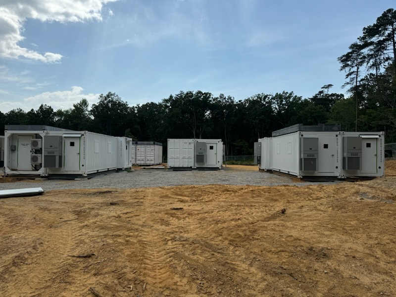 Sea containers are pictured at the main site of ARM's Bankhead National Forest atmospheric observatory, which will begin operations in fall 2024 in Alabama. Photo is by Patty Campbell, Argonne National Laboratory.