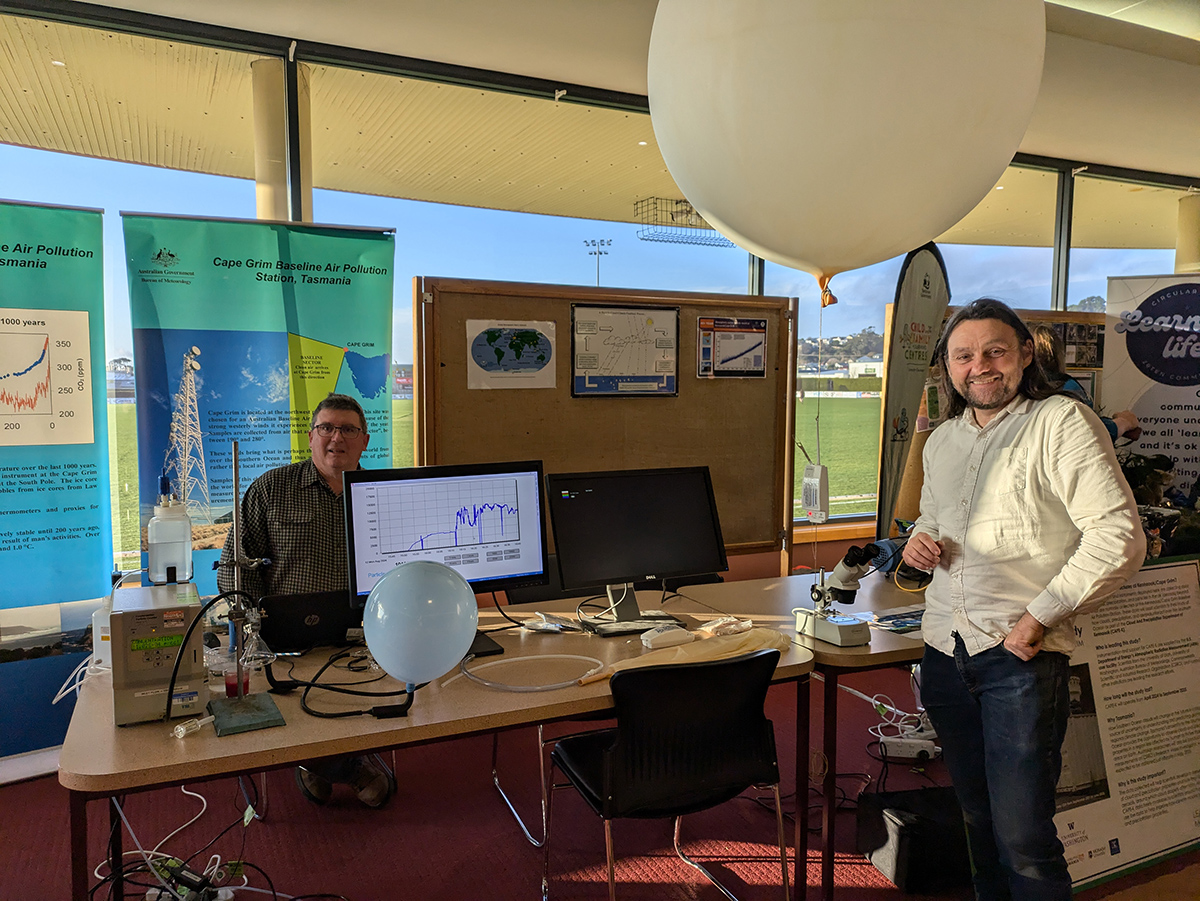 Nigel Somerville (left) and Jeremy Ward, Australian Bureau of Meteorology staff from the Kennaook / Cape Grim Baseline Air Pollution Station, prepare to engage with the children of Smithton, Tasmania, at the Circular Head Science Gig on August 12, 2024. The station is hosting ARM’s Cloud And Precipitation Experiment at kennaook (CAPE-k) from April 2024 to September 2025. Photo is courtesy of Frank Zurek, Hamelmann Communications. 